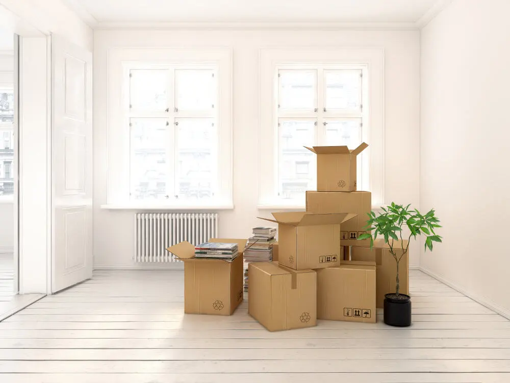 A nearly empty room under renovation with a ladder and natural light — illustrating an unoccupied house needing specialist empty house insurance.
